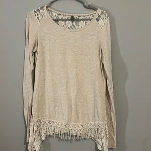 Medium cream top. Long sleeve with gems and lace